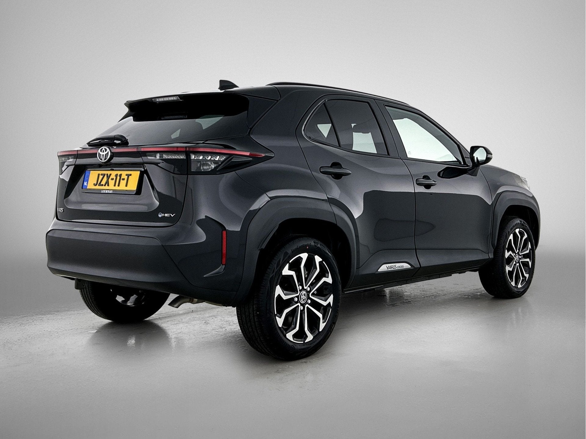Toyota Yaris Cross 1.5 Hybrid 115 First Edition + | BTW Voer, Stof, Gebruikt, 116 pk, Zwart