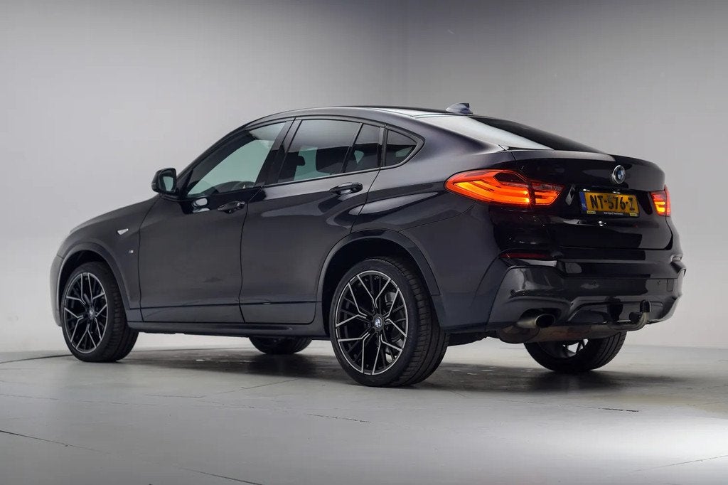 BMW X4 xDrive 20i M Sport High Executive Aut. [ Leder Camera, Auto's, BMW, Automaat, Gebruikt, Zwart, Bedrijf