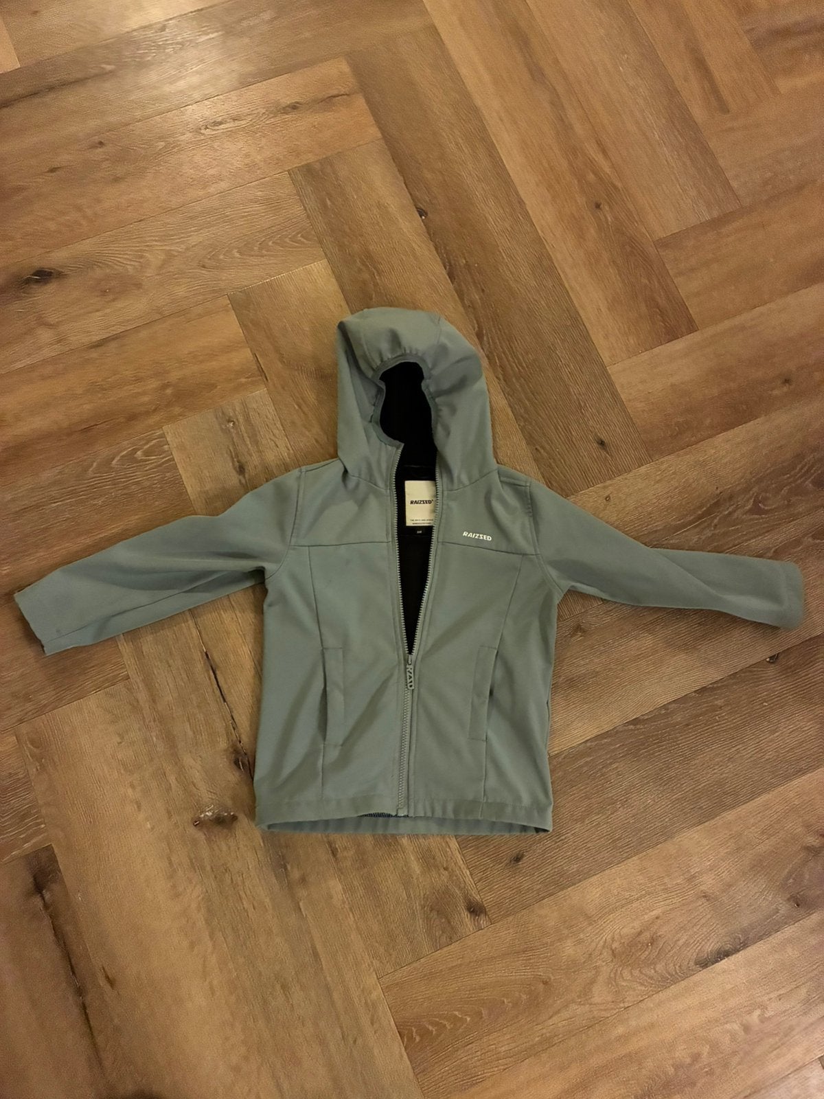 Raized softshell jas maat 116, Ophalen of Verzenden, Zo goed als nieuw, Regenjas