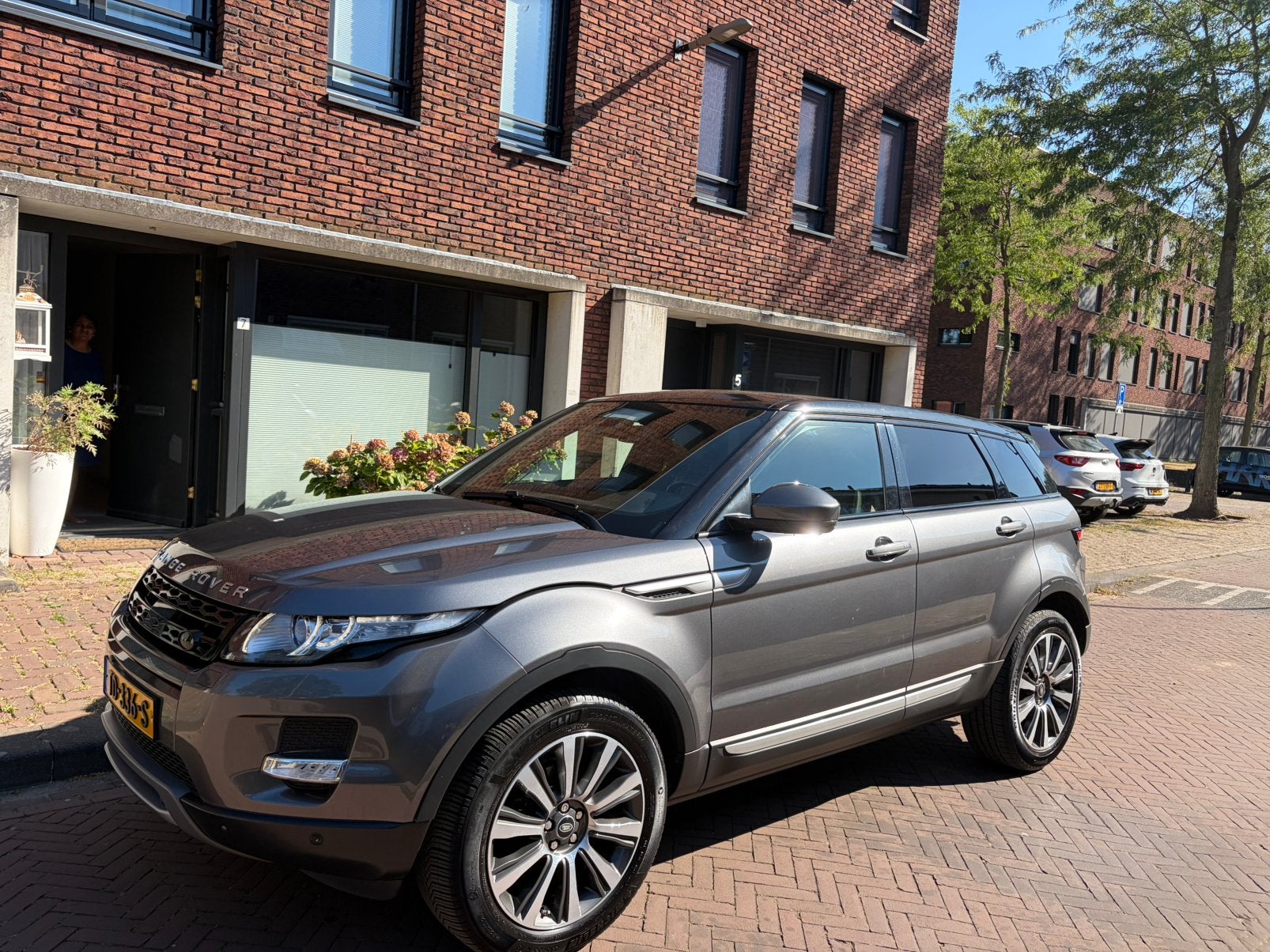 Land Rover Range Rover Evoque 2.0 SI4 4WD AUT 2015 Grijs, Auto's, 1800 kg, Zwart, Leder, Vierwielaandrijving