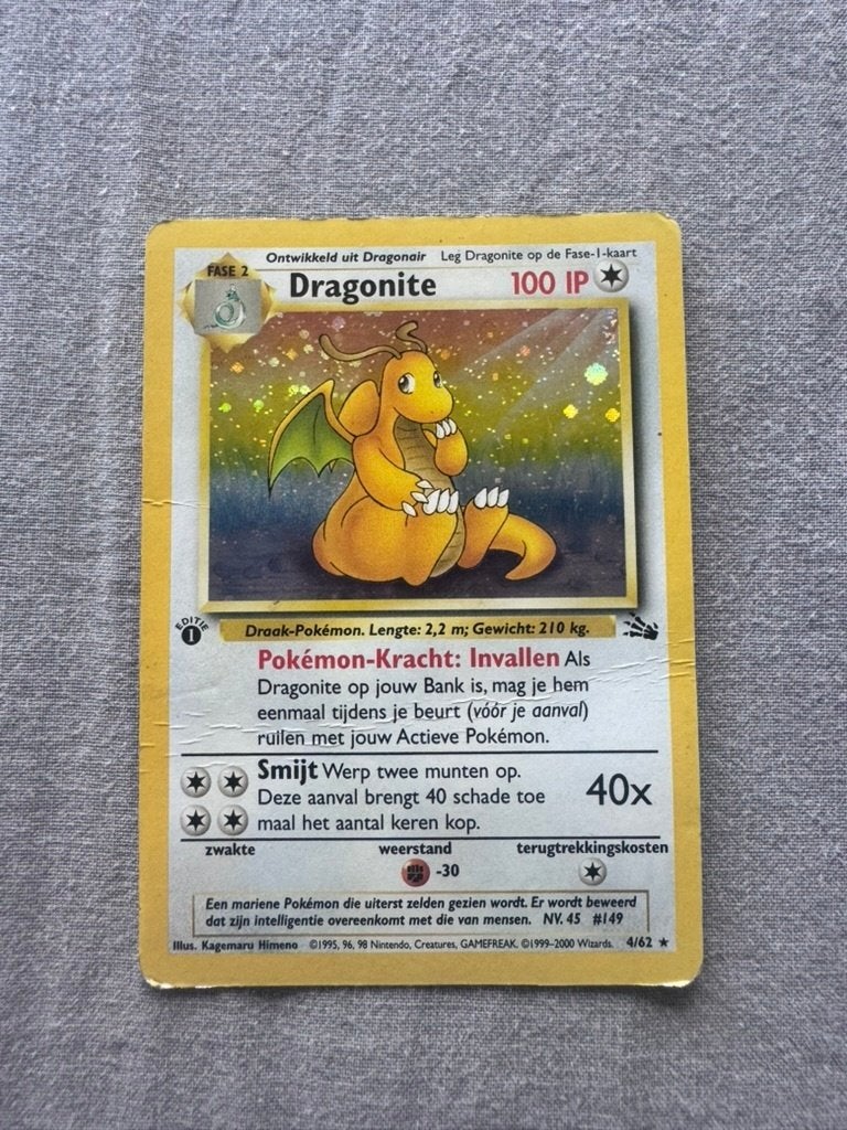 Dragonite (FO 4) First Edition (NL), Ophalen of Verzenden, Gebruikt, Losse kaart, Foil