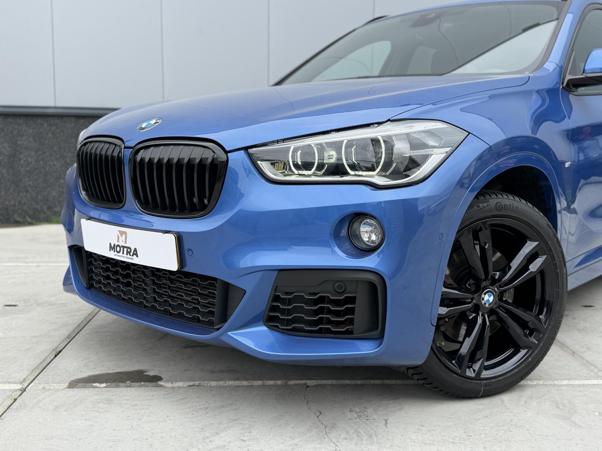 BMW X1 sDrive20i High Executive | M Sport | LED | Camera | S, Auto's, BMW, 1998 cc, Euro 6, Blauw, Alcantara