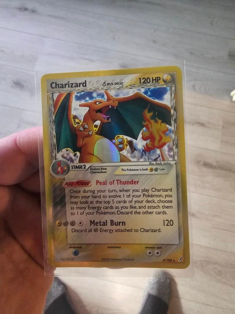Charizard 4 delta species, Ophalen of Verzenden, Gebruikt, Losse kaart, Foil