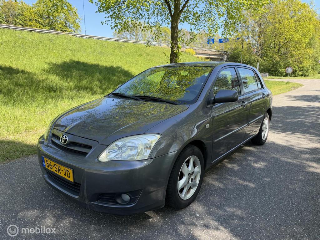 Toyota Corolla 1.6 VVT-i Anniversary*APK 02/27*AIRCO*CRUISE, Auto's, Gebruikt, Zwart, 4 cilinders, Corolla