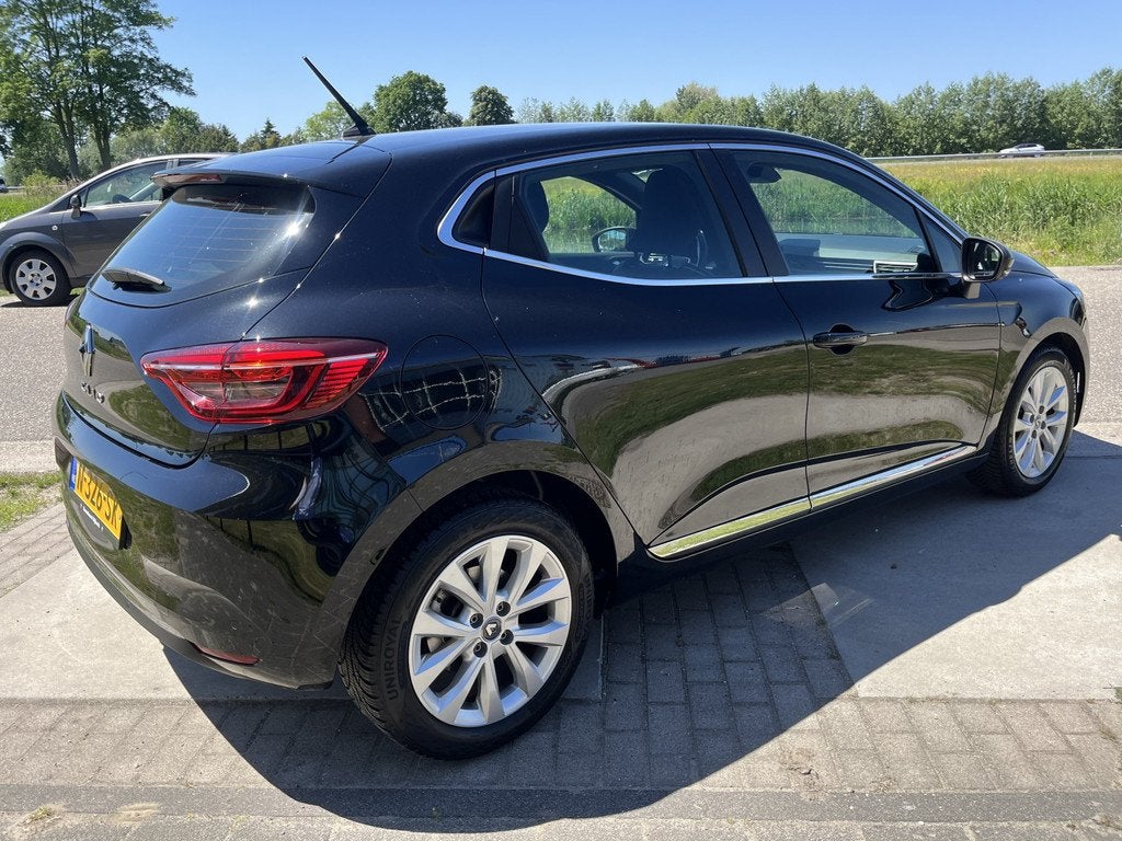 Renault Clio 1.0 TCe Intens / Dealer onderhouden / Navigatie, Voorwielaandrijving, 12 maanden, Gebruikt, Leder en Stof