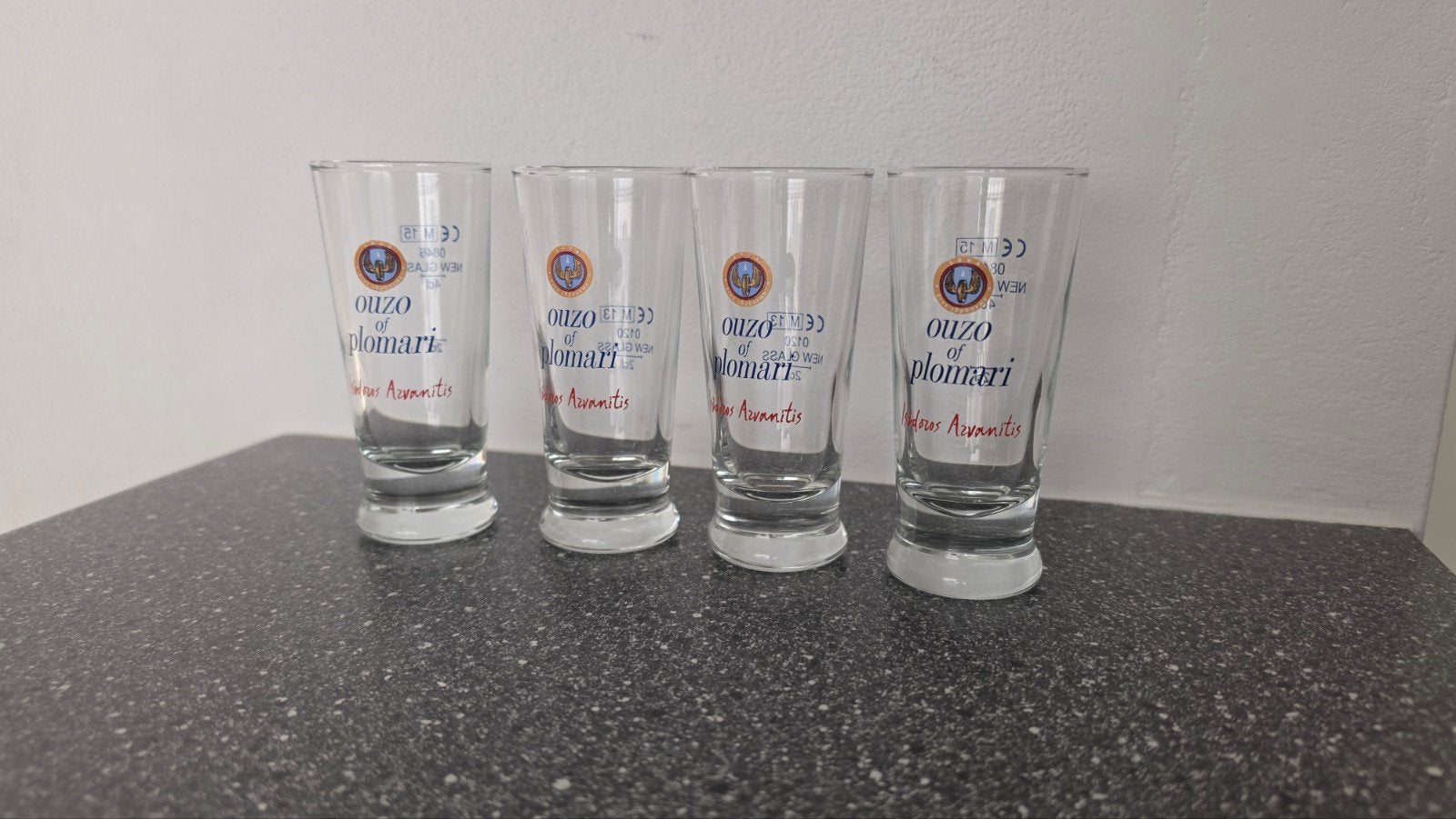 Set van 4 Ouzo of Plomari shotglaasjes, Ophalen of Verzenden, Zo goed als nieuw, Borrel- of Shotglas