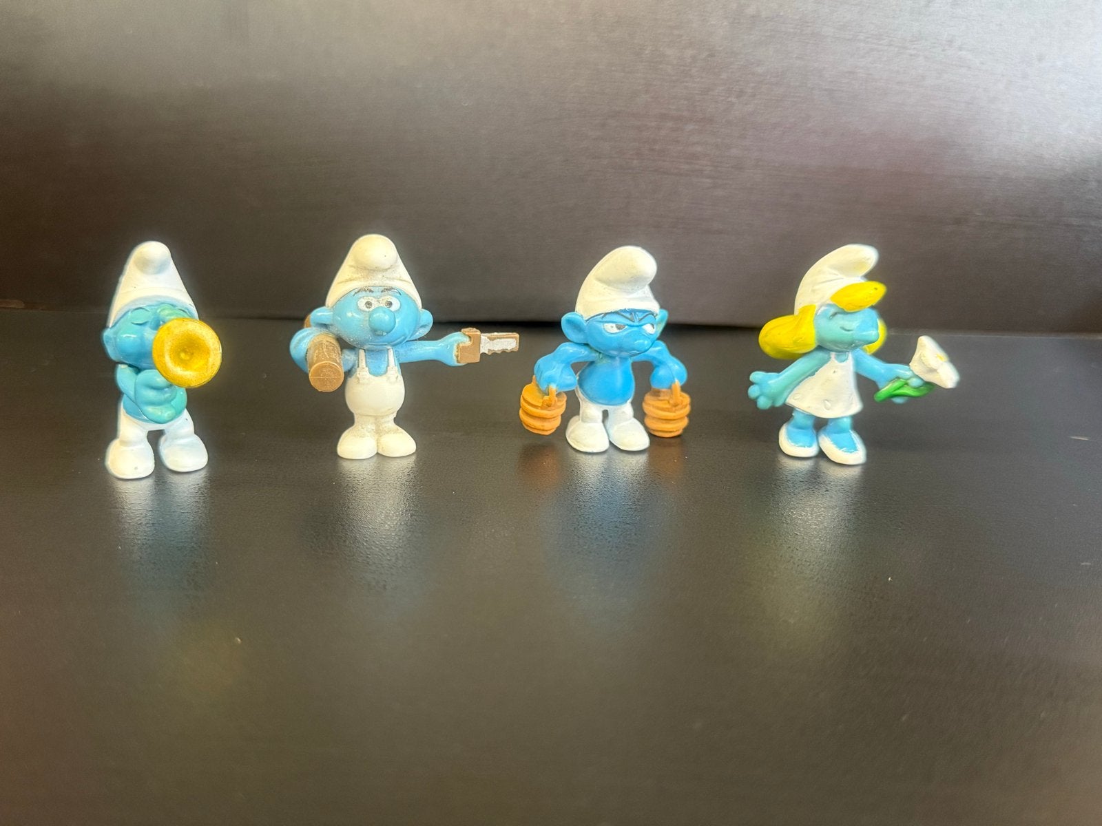 Set van 4 Smurfen beeldjes: Muzikant, Klusjesman, Sterke Smu, Verzamelen, Ophalen of Verzenden, Gebruikt, Verschillende Smurfen