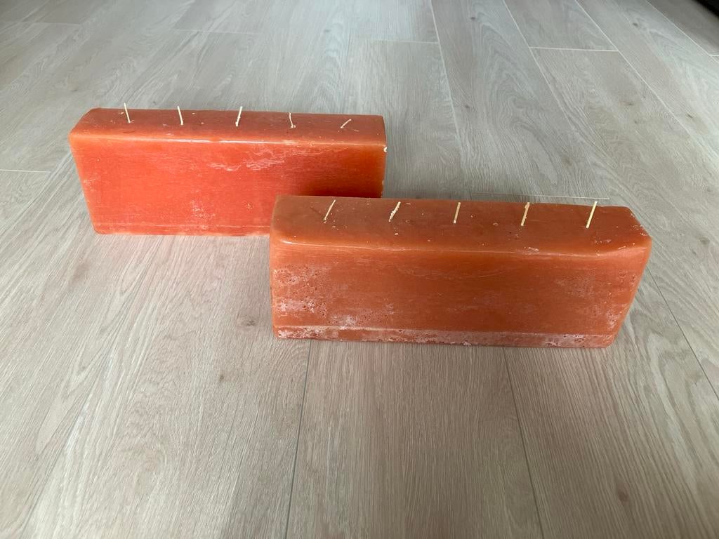 2 grote oranje kaarsenblokken, Huis en Inrichting, Woonaccessoires | Kandelaars en Kaarsen, Verzenden, Nieuw, Overige materialen