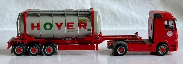 Herpa 150712: Mercedes-Benz Actros met tankcontainer HOYER, Ophalen of Verzenden, Gebruikt, Bus of Vrachtwagen, Herpa