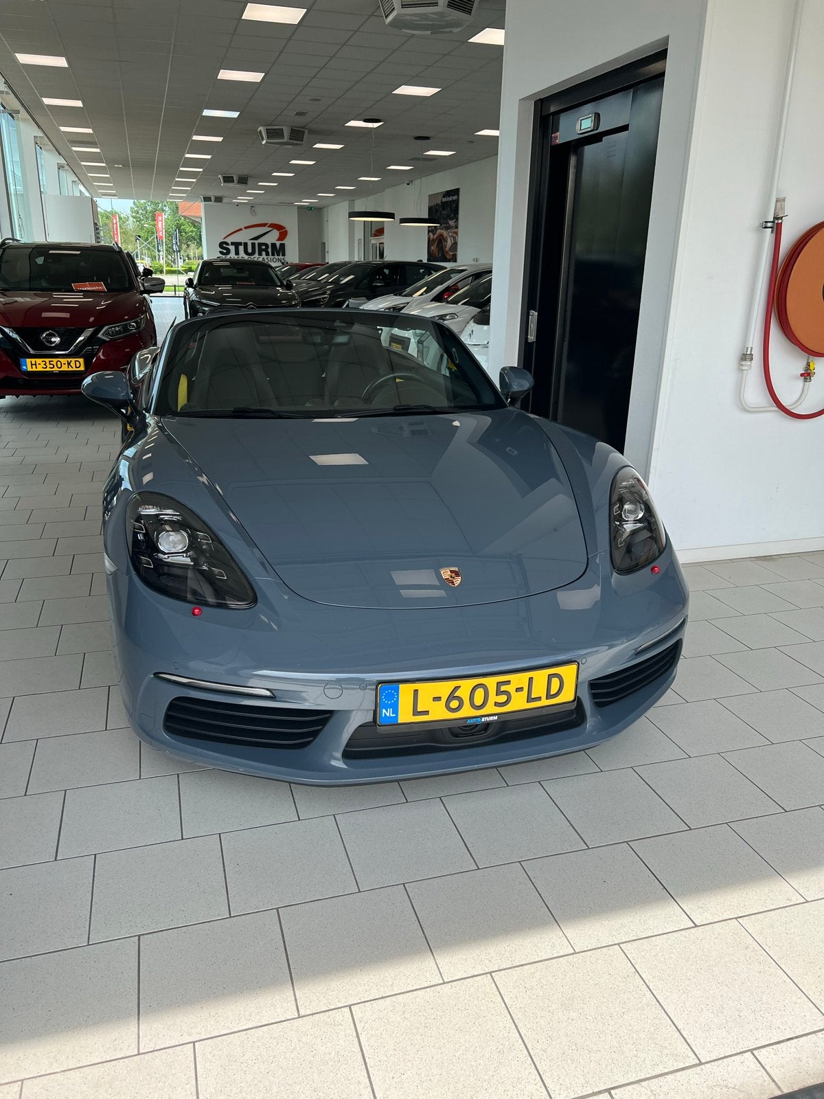 Te koop in top staat Porsche 718 2.0 300PK PDK 2017 Grijs, Auto's, Automaat, Achterwielaandrijving, 4 cilinders, Cabriolet
