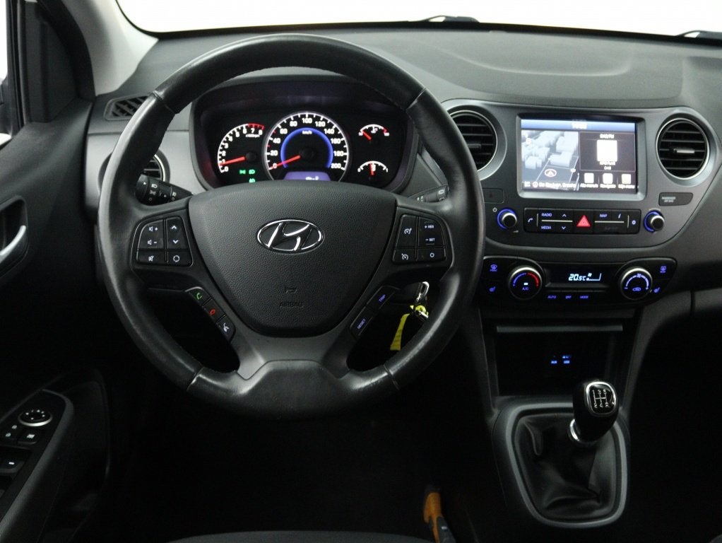 Hyundai i10 1.0i i-Premium | Navigatie | Stoelverwarming | C, Auto's, Keurmerk '100% Onderhouden', 12 maanden, Stof, Gebruikt