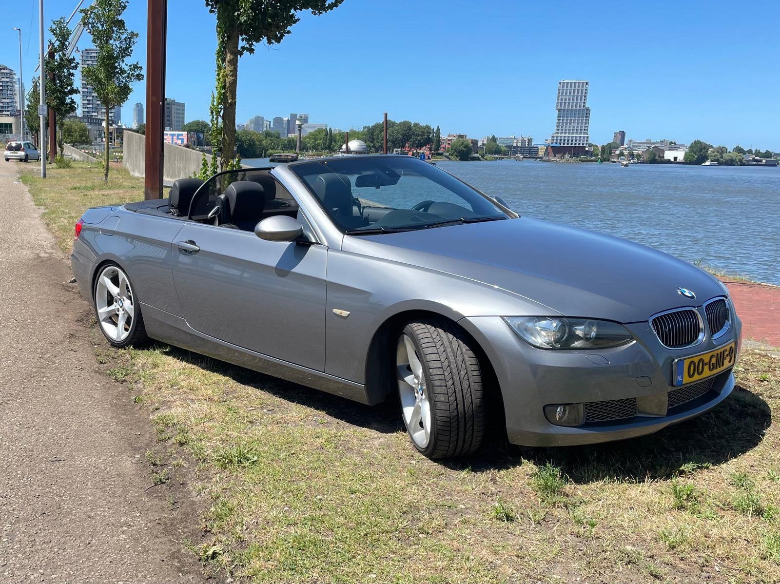 BMW 3-Serie 3.0 I 335 Cabrio AUT 2008 Grijs High Executive, Auto's, BMW, Automaat, Achterwielaandrijving, Zwart, Cabriolet