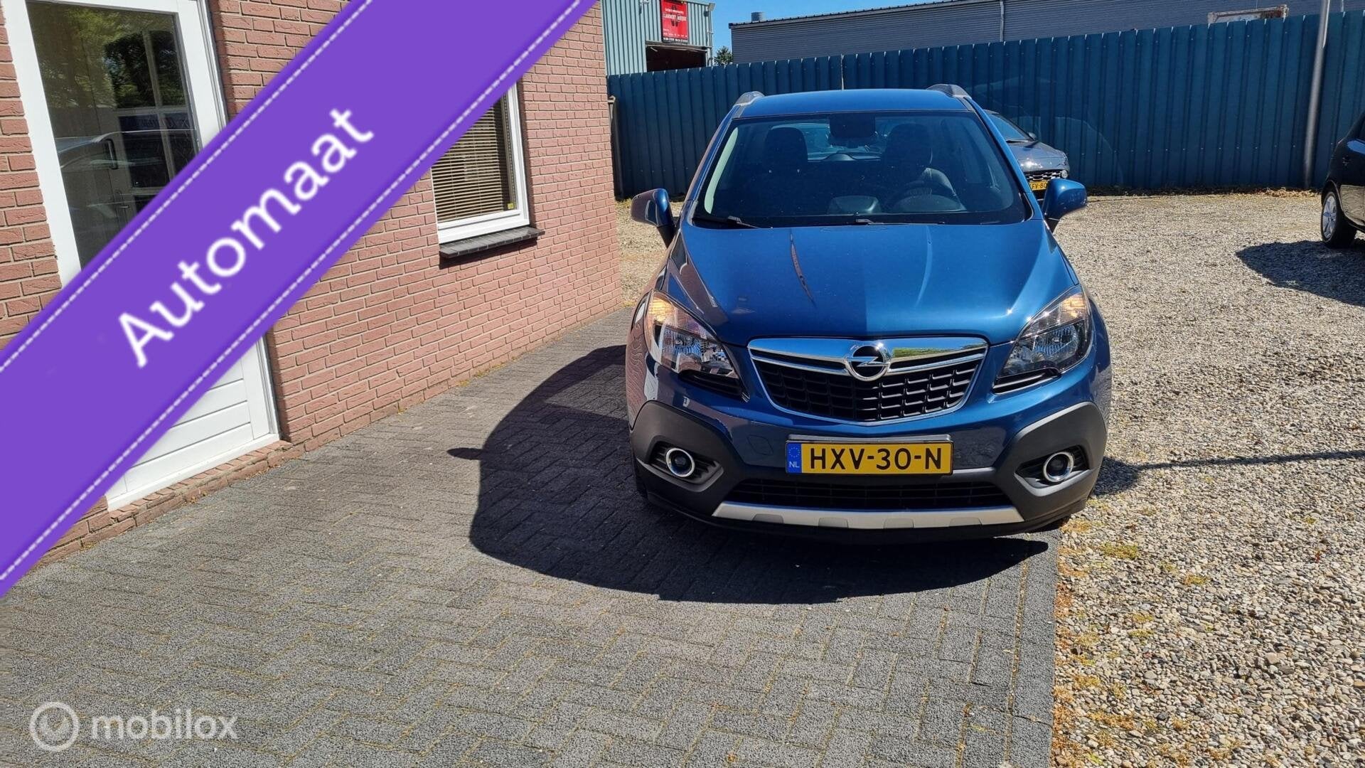 Opel Mokka 1.4 T 140 PK Cosmo AUTOMAAT, Gebruikt, Blauw, 1364 cc, SUV of Terreinwagen