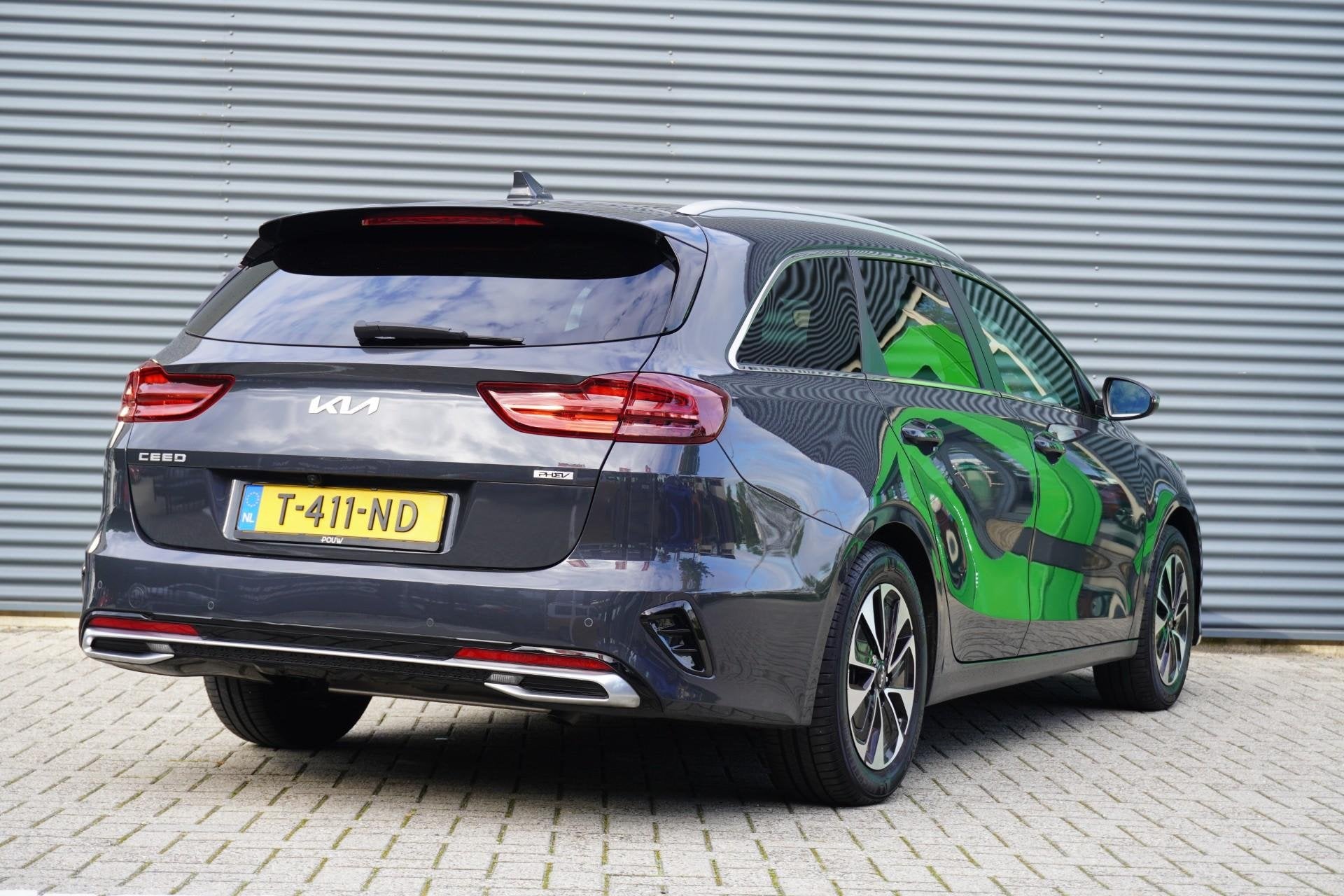 Kia Ceed Sportswagon 1.6 GDI PHEV 140pk DynamicPlusLine Trek, Auto's, 12 maanden, Gebruikt, Leder en Stof, 1508 kg