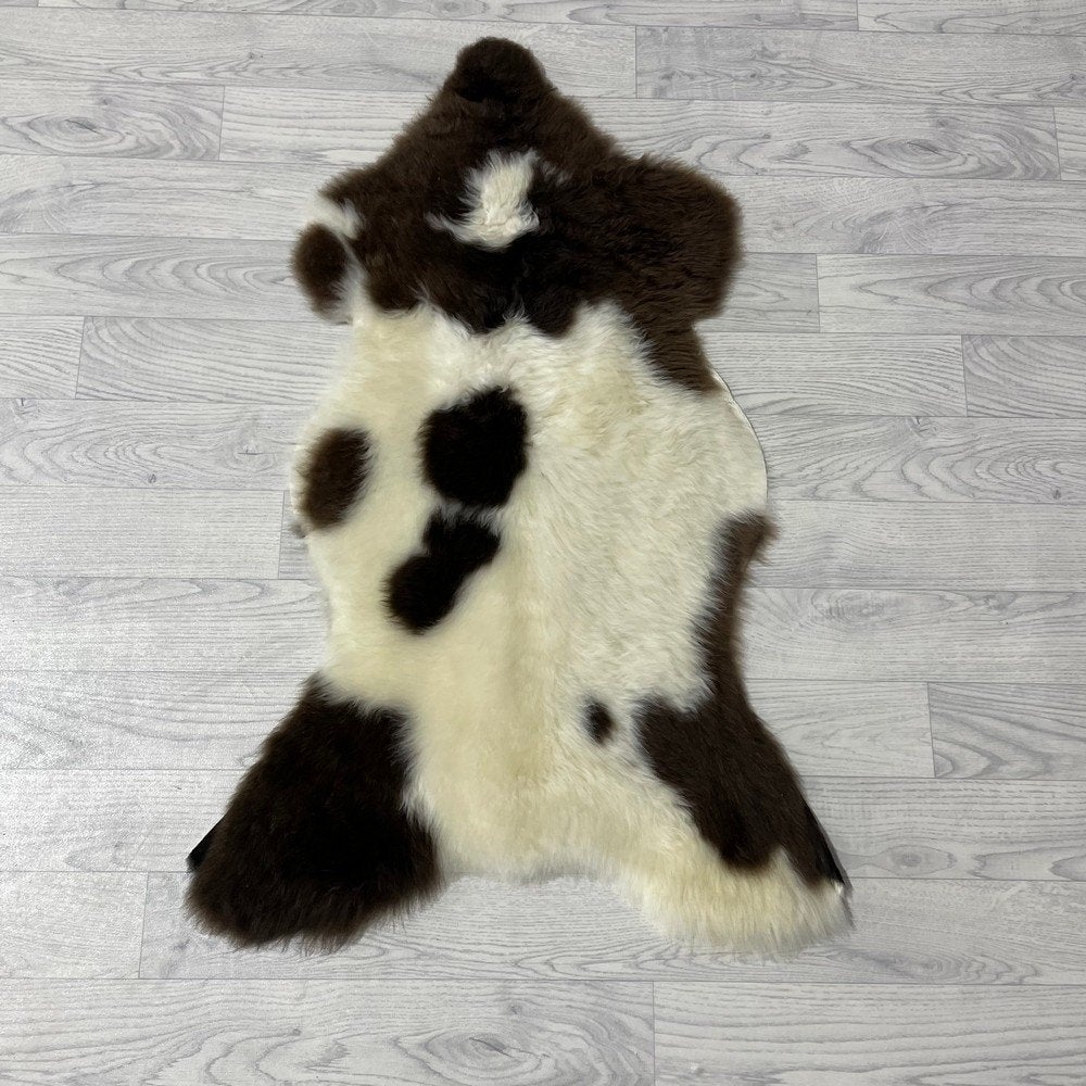 Schapenvacht bruin wit 95x60cm #1542 | Lederstore, Nieuw, Overige vormen, Bruin, 50 tot 100 cm
