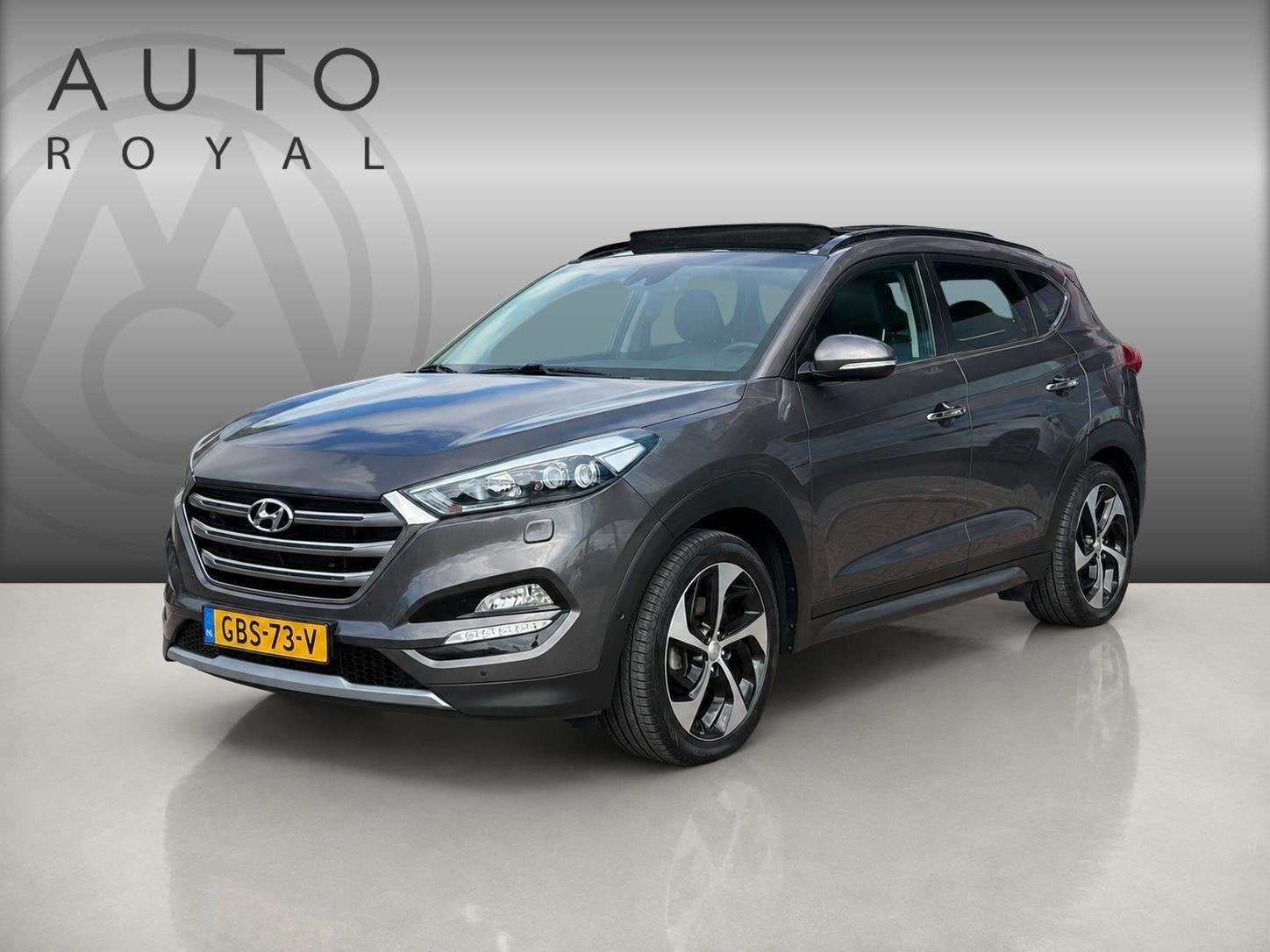 Hyundai Tucson 1.6 T-GDi Premium 4WD LEDER | KEYLESS ENTRY/G, Auto's, Gebruikt, 4 cilinders, Bruin, 1600 kg