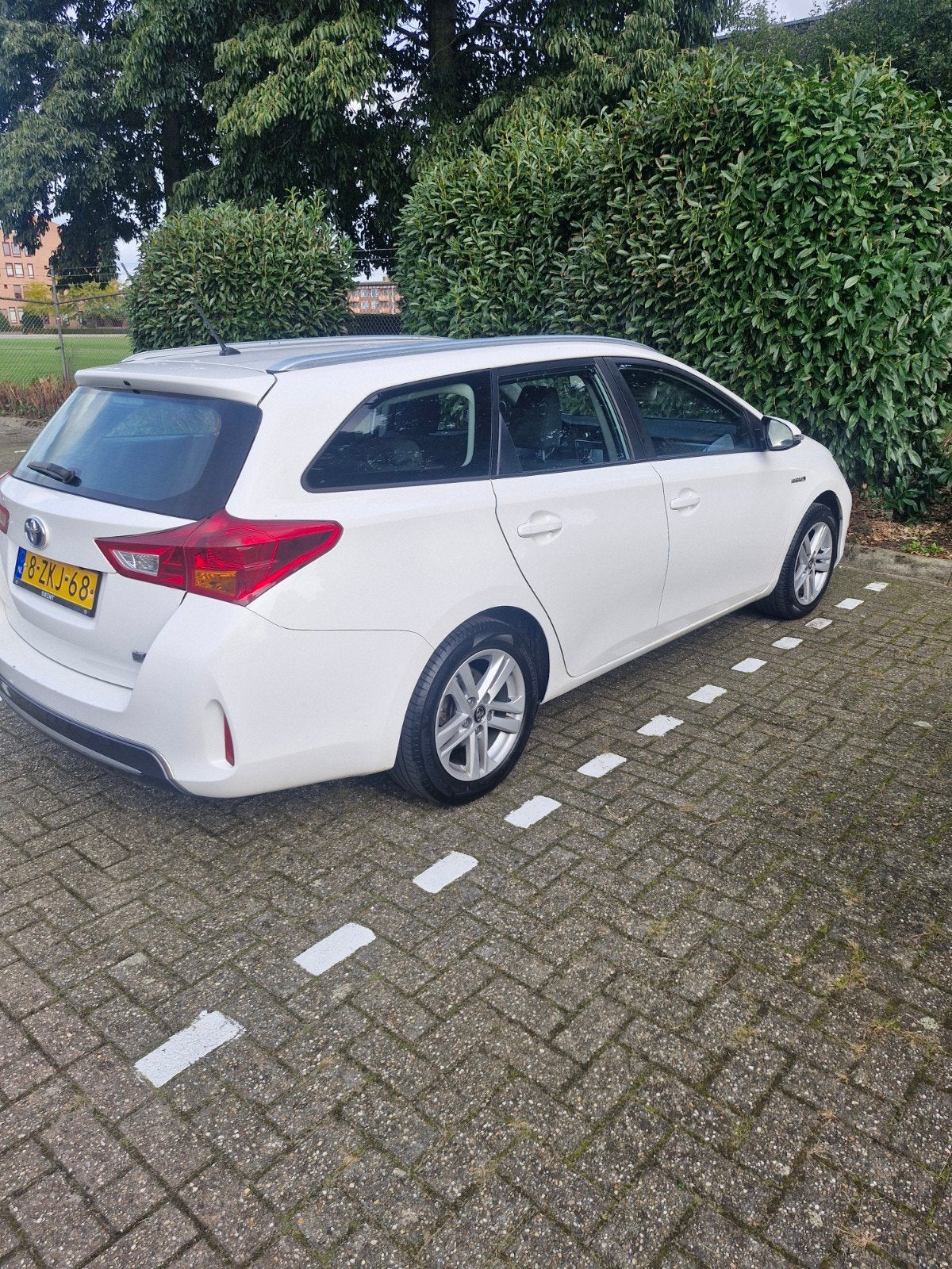 Toyota Auris 1.8 Hybrid Touring Sports CVT 2015 Wit, Dealer onderhouden, Zwart, 345 kg, Adaptive Cruise Control