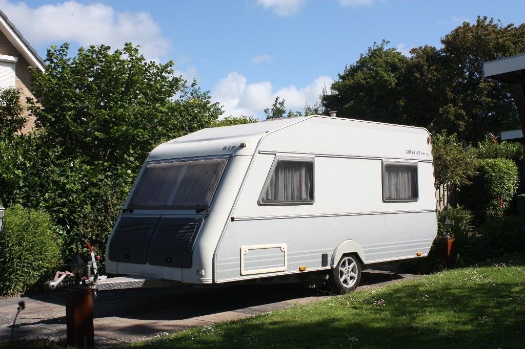 Te koop KIP Grey-line Special 44G VERKOCHT, Caravans en Kamperen, Caravans, Standaardzit, Schokbreker, Bedrijf, 4 tot 5 meter