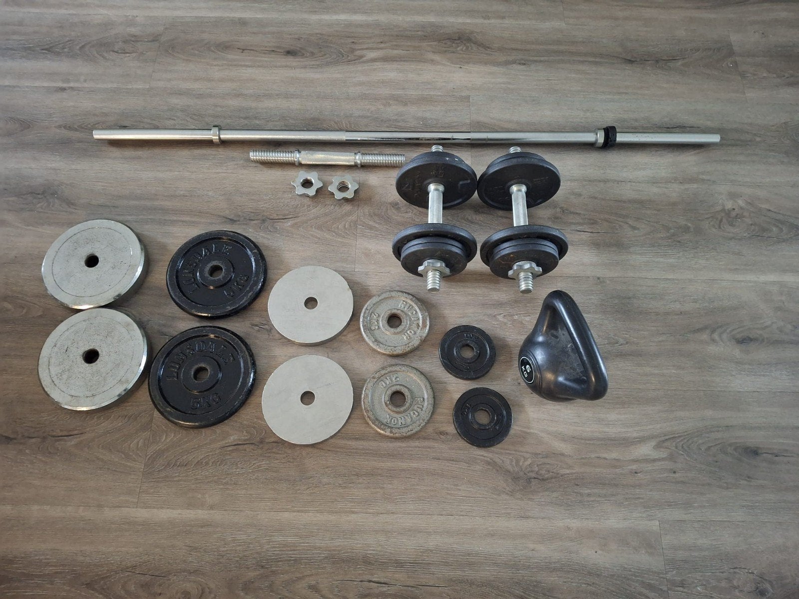 Complete set halters, dumbbells, gewichten & kettlebell, Ophalen, Gebruikt, Rug, Dumbbell
