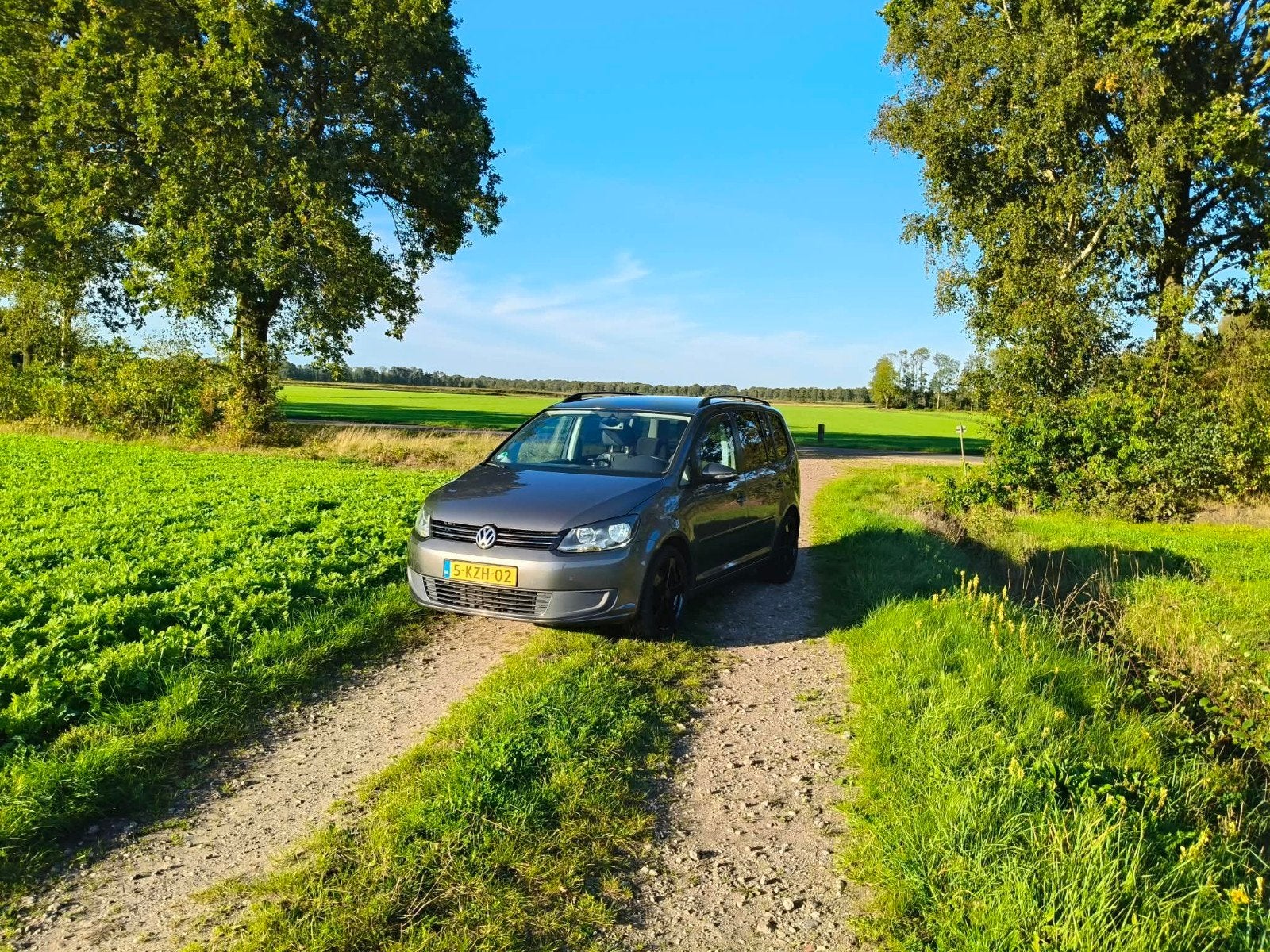 Volkswagen Touran 1.2 TSI  2013 Grijs, Auto's, 730 kg, Xenon verlichting, 4 cilinders, Origineel Nederlands