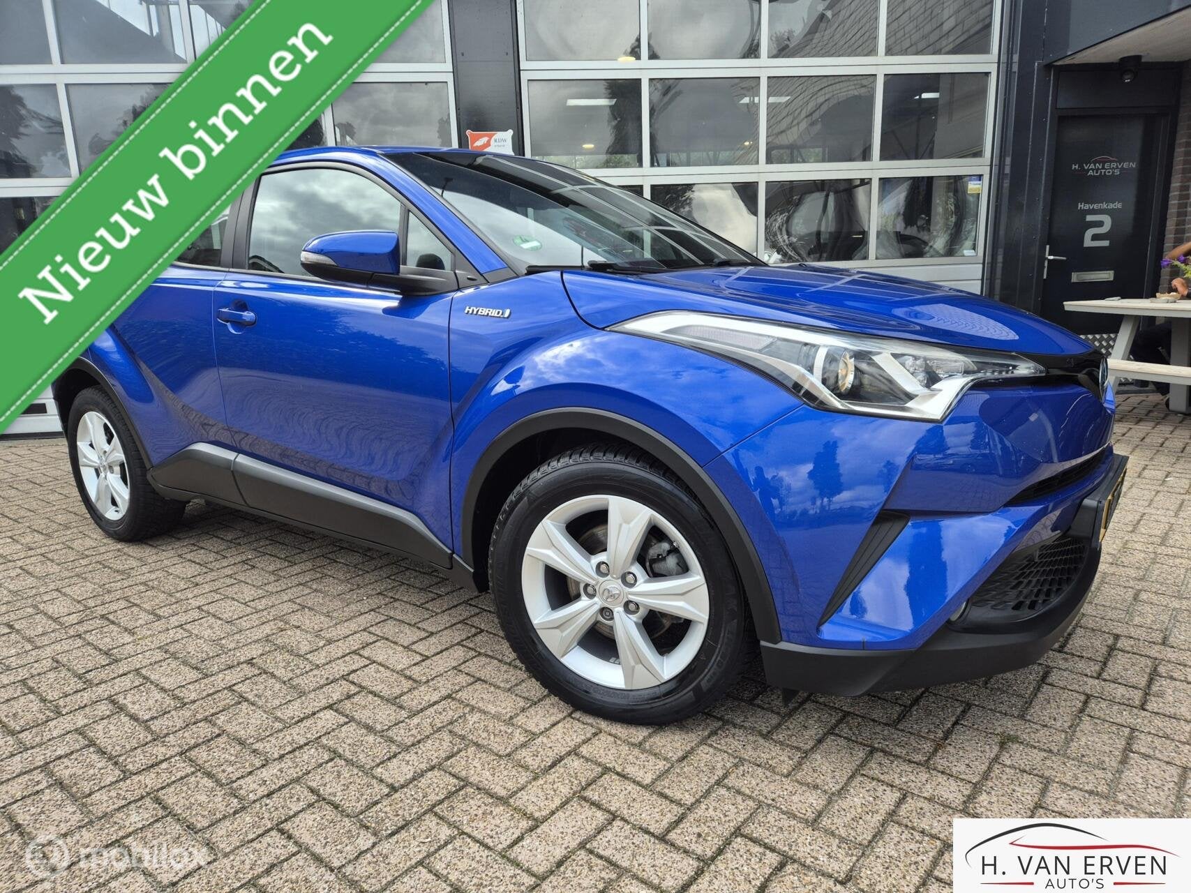 Toyota C-HR 1.8 Hybrid Premium NAVI CAMERA 17" ADAPTIVE, Auto's, Dealer onderhouden, 725 kg, 4 cilinders, Blauw