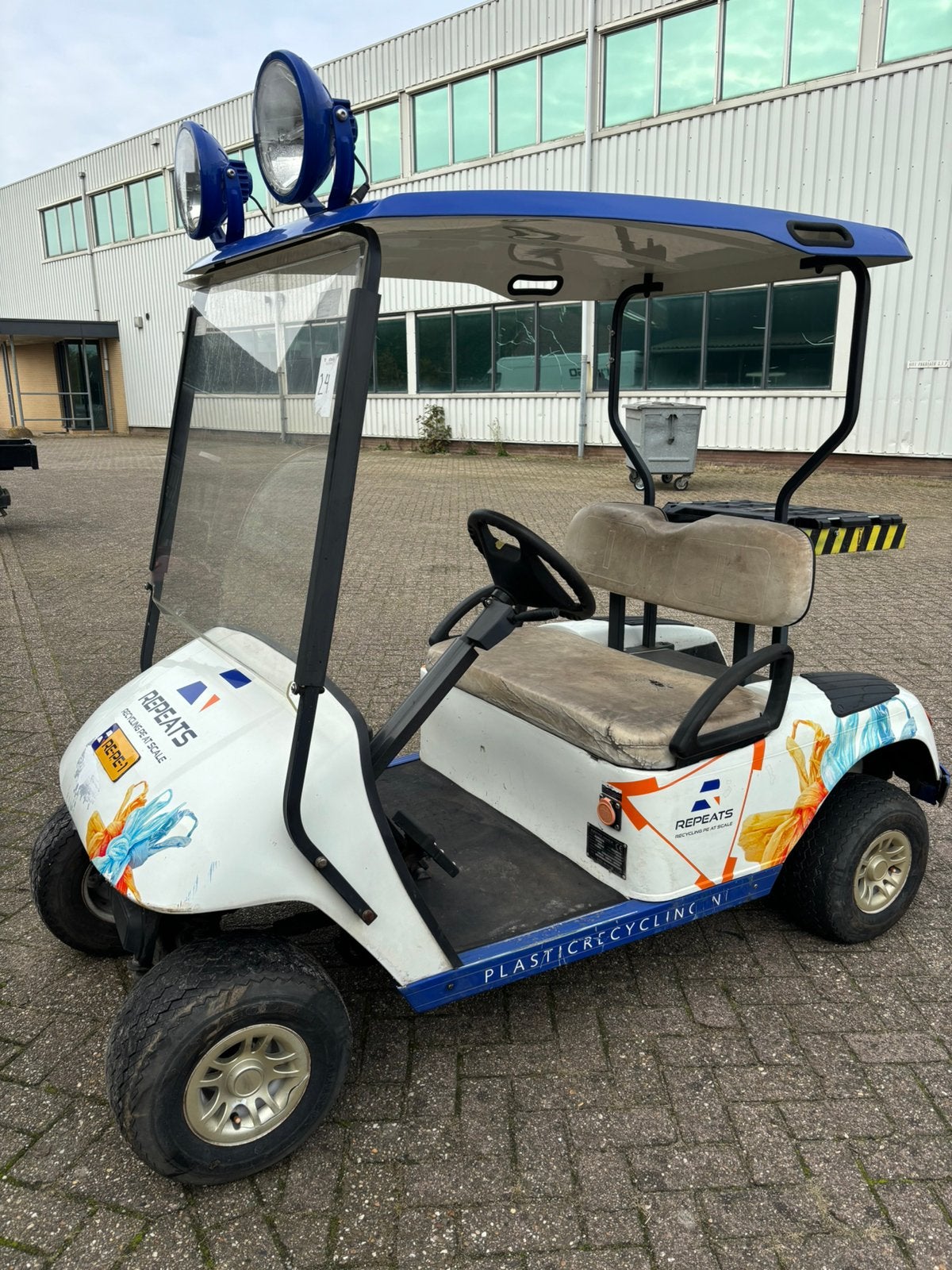 Golfkar elektrisch met landbouwkenteken