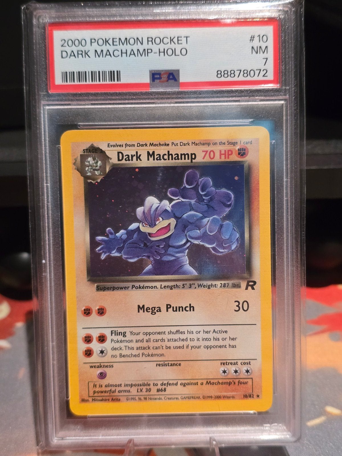 Dark Machamp Team Rocket PSA 7 | 10/82, Ophalen of Verzenden, Zo goed als nieuw