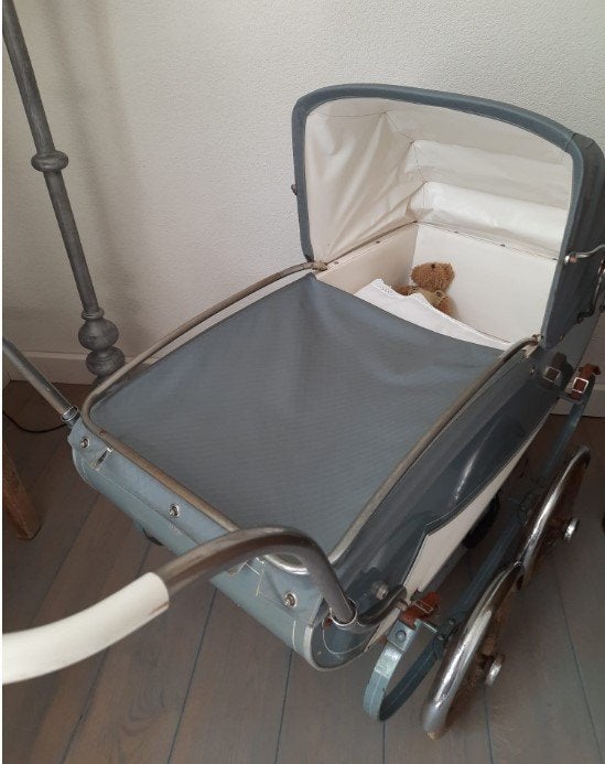 prachtige antieke kinderwagen, Ophalen