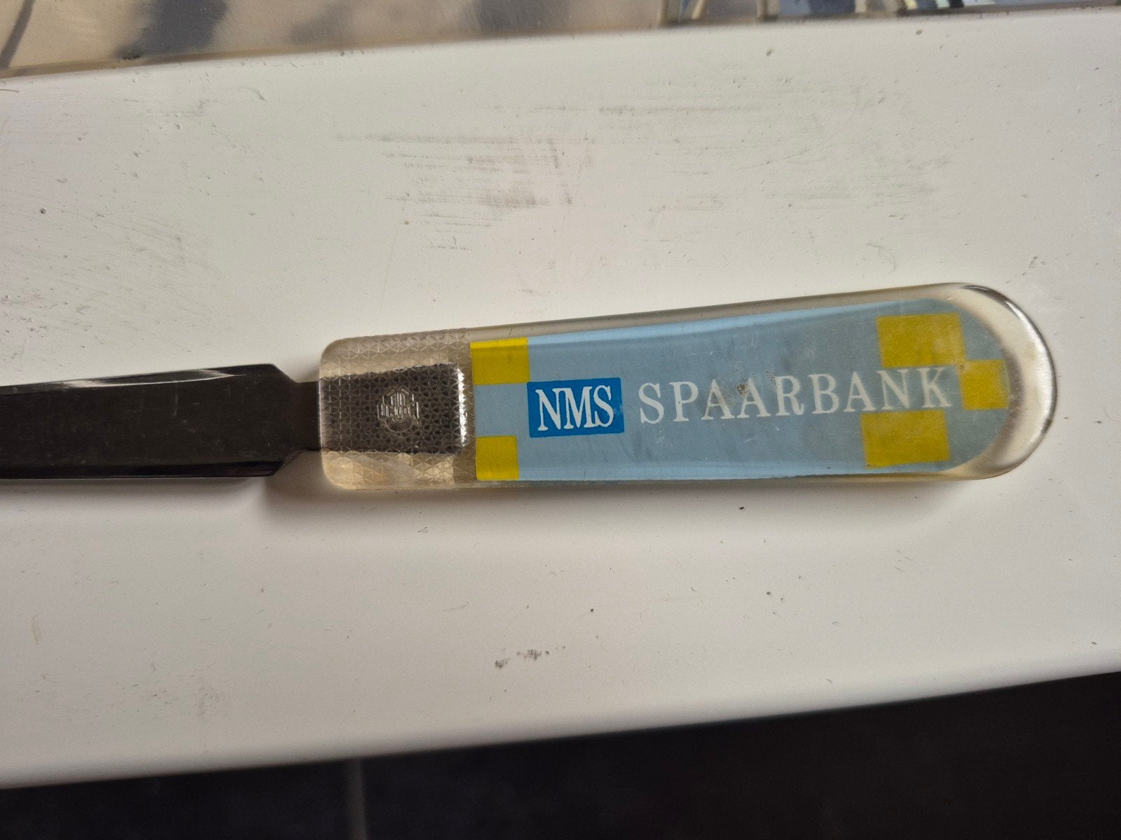 Een oude brieven opener  nms spaarbank, Ophalen of Verzenden, Gebruiksvoorwerp