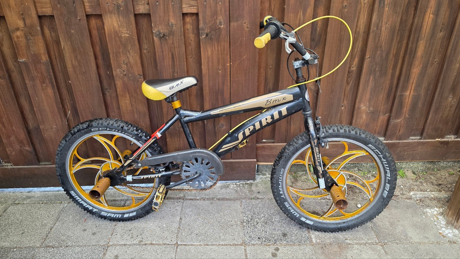 BMX Spirit - Zwart/Goud - Perfect voor stunts en plezier!, Ophalen, Gebruikt, Staal, Velgrem