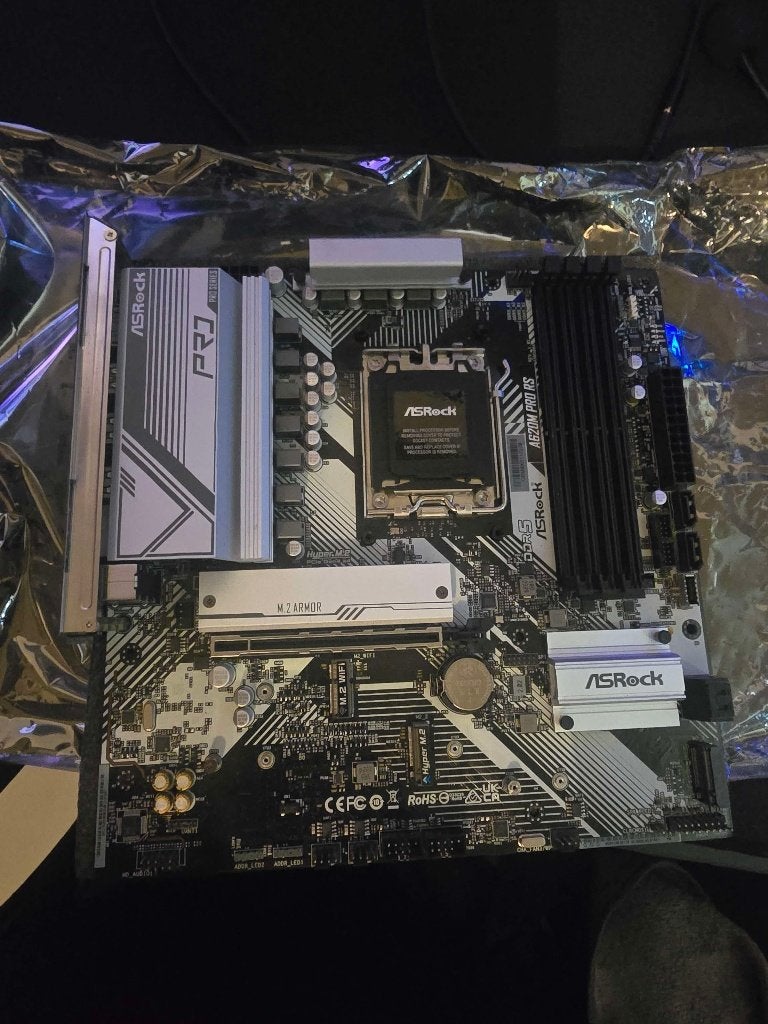 Asrock A620M Pro RS (+ Wifi Adaptor), Computers en Software, Moederborden, Gebruikt, Ophalen of Verzenden, Micro-ATX, DDR5