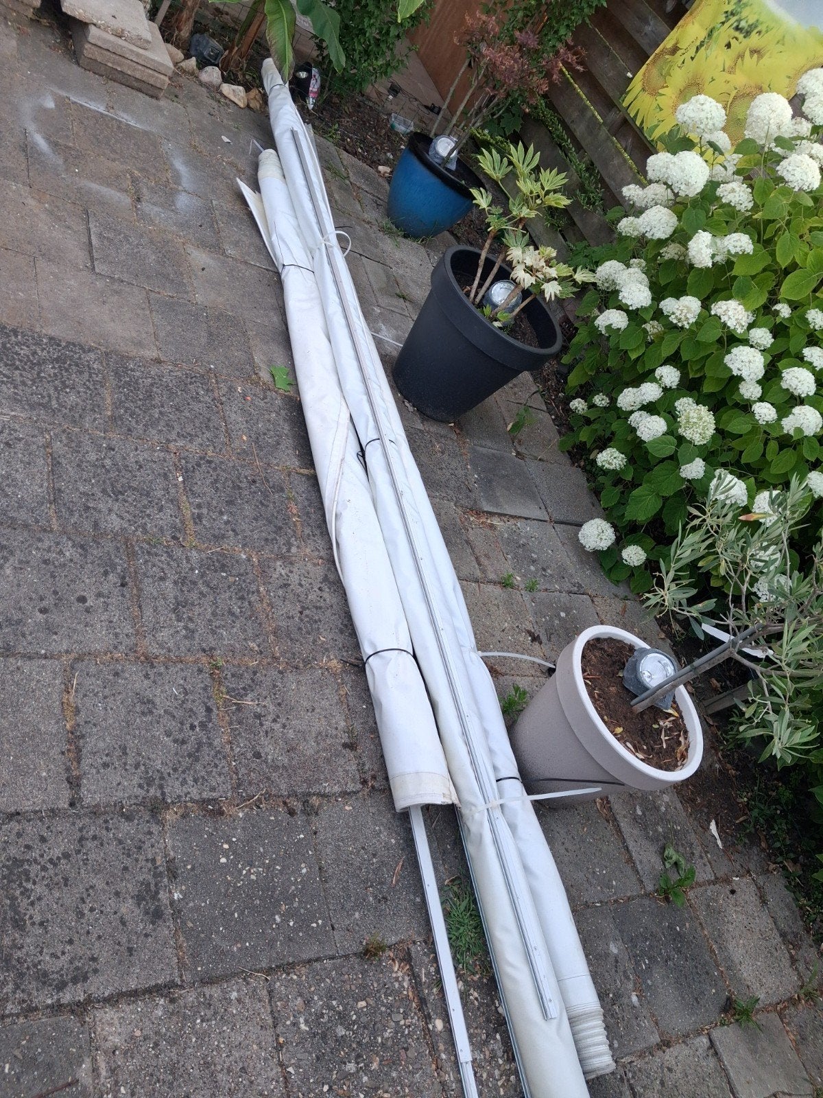Verandazeil, Ophalen, Knikarmscherm