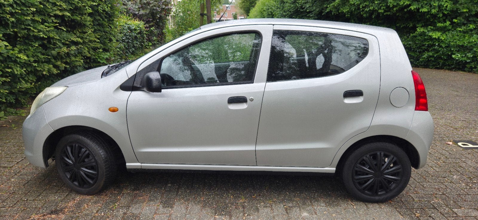 Suzuki Alto 1.0 2010 Grijs, Auto's, Voorwielaandrijving, Stof, 4 stoelen, Origineel Nederlands