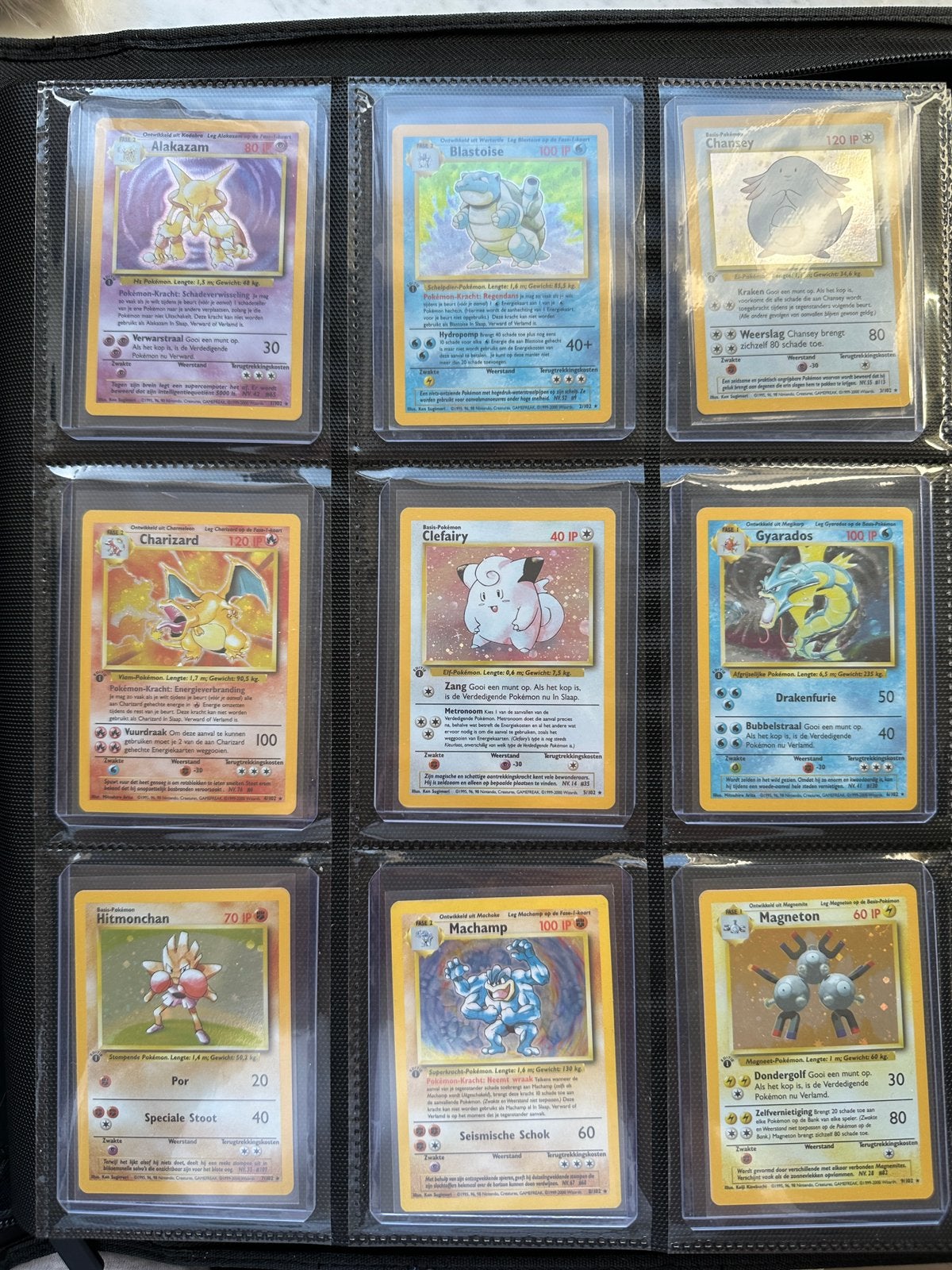 1st edition Base set Dutch compleet 102/102 pack fresh, Ophalen, Zo goed als nieuw, Meerdere kaarten, Foil