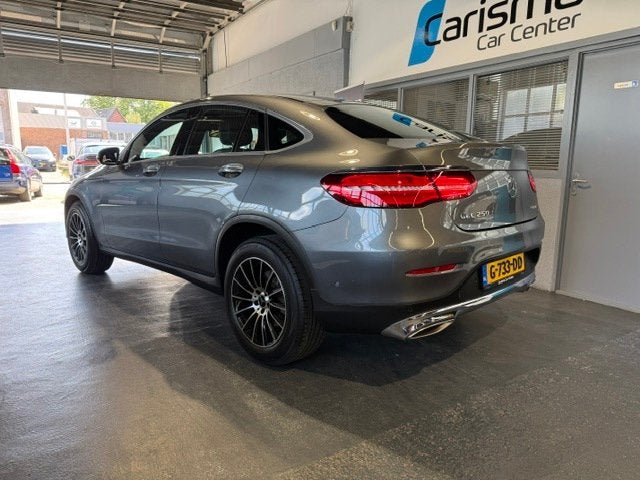 Mercedes-Benz GLC-klasse Coupé 250 4MATIC Business Solution, Auto's, Dealer onderhouden, Gebruikt, 4 cilinders, Leder en Stof