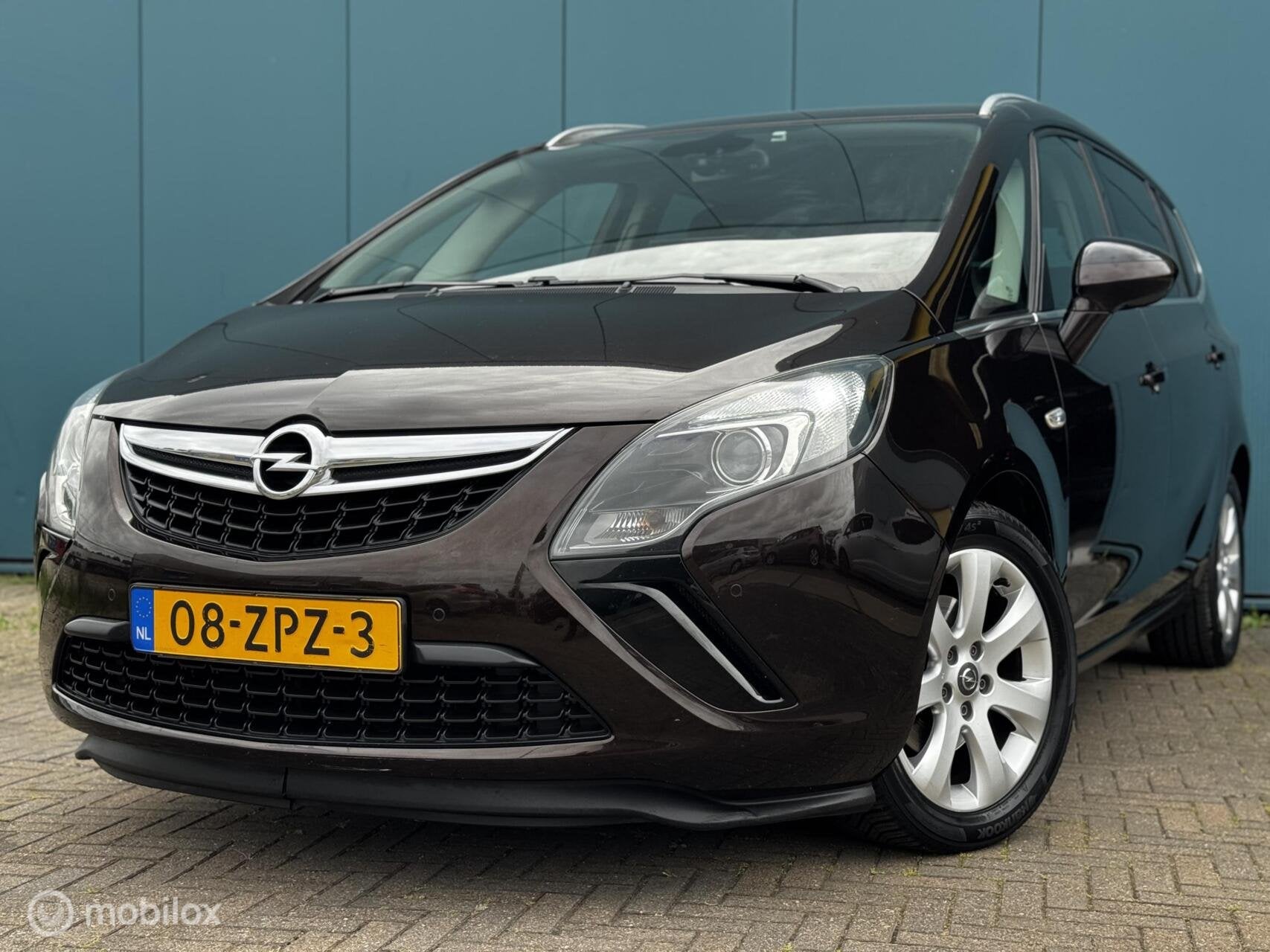 Opel Zafira Tourer 1.4 Business+ 7p. APK Airco Cruise Contro, Auto's, Euro 5, Gebruikt, 4 cilinders, Bruin