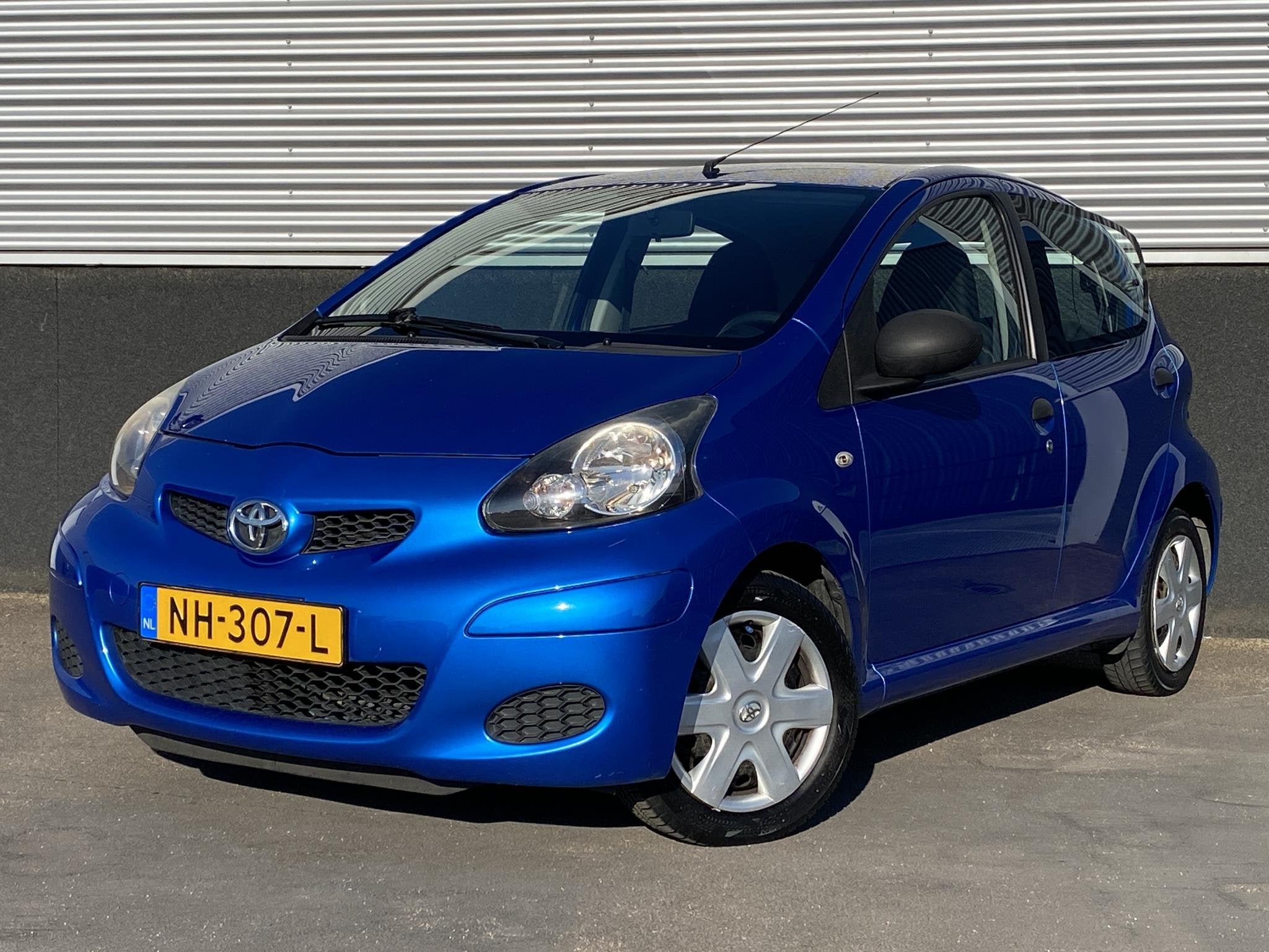 Toyota Aygo 1.0-12V Access airco / 5 deurs / leuke zuinige a, Auto's, Voorwielaandrijving, Euro 5, Stof, Gebruikt
