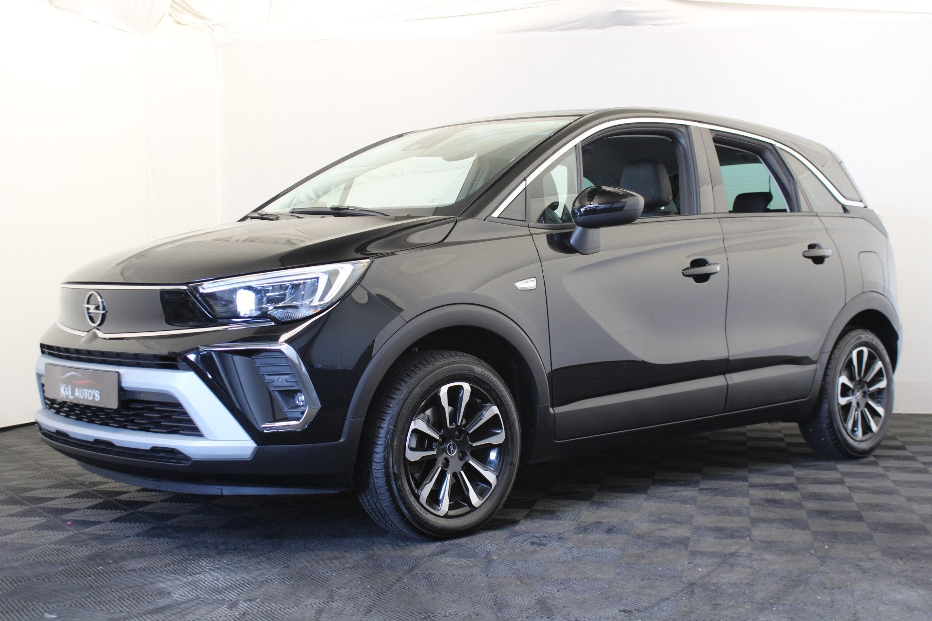 Opel Crossland 1.2 Turbo Elegance (bj 2024, automaat), Auto's, Opel, Gebruikt, 1199 cc, Zwart, 600 kg