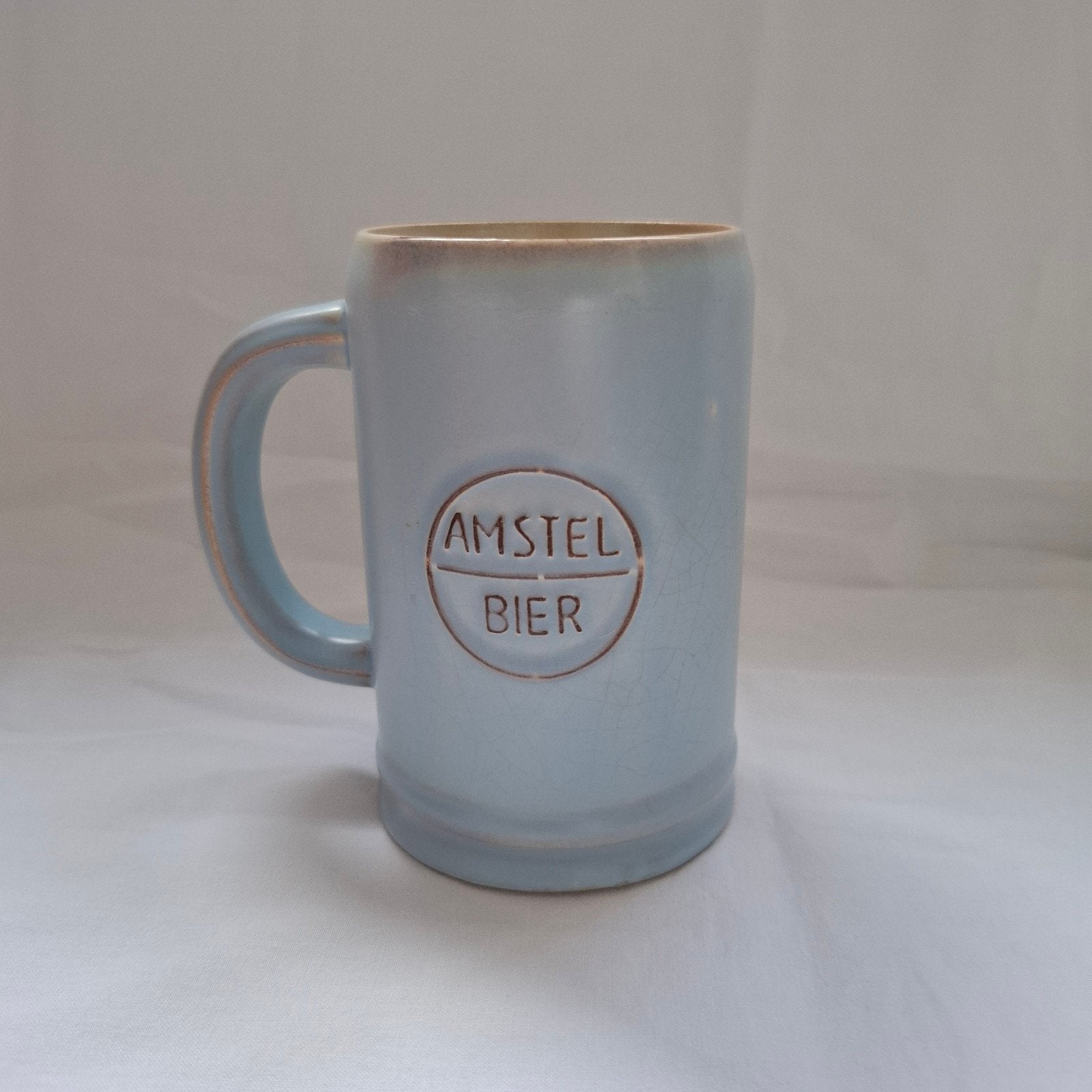 Amstel Bierpul - Lichtblauw aardewerk, Verzamelen, Verzenden
