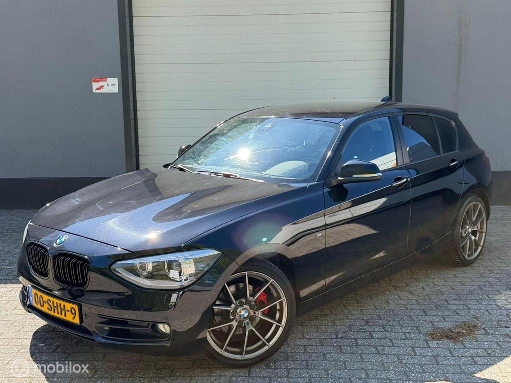BMW 1-serie 118i Sport Line / automaat / nap / navi / cruise, Auto's, BMW, Euro 5, Achterwielaandrijving, 4 cilinders, 1290 kg