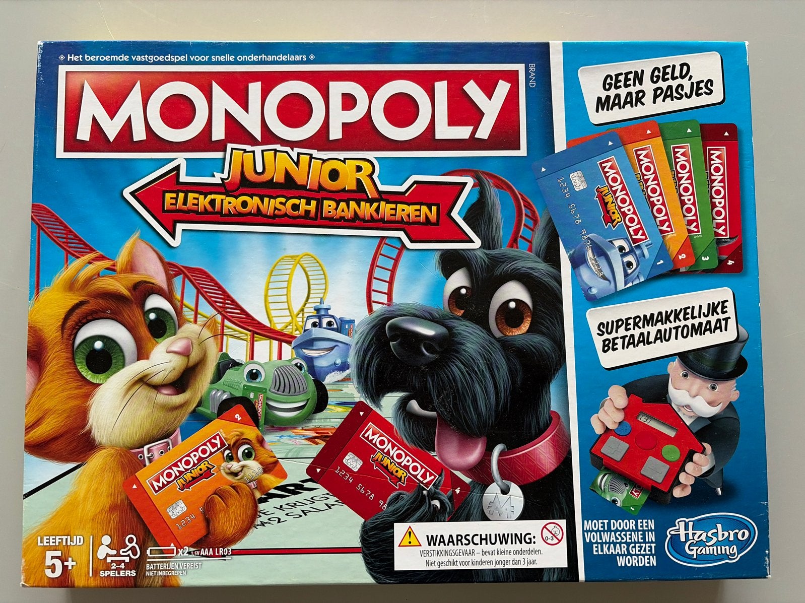 Monopoly Junior Elektronisch Bankieren, Hobby en Vrije tijd, Drie of vier spelers, Ophalen of Verzenden, Zo goed als nieuw