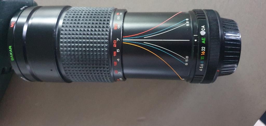 Zoom lens fotocamera Sakar MC Zoom 1:4.0 F=28-200mm 67mm, Audio, Tv en Foto, Fotografie | Lenzen en Objectieven, Ophalen of Verzenden