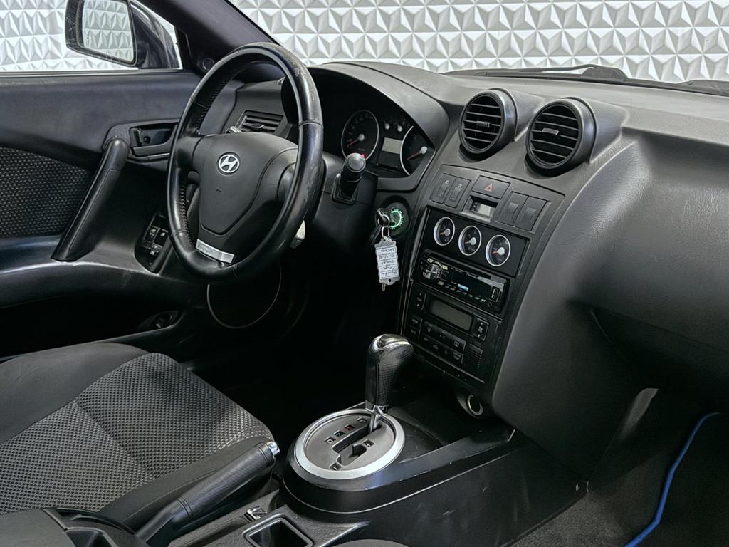 Hyundai Coupé 2.7i V6 FX met onderhoudshistorie! (2002), Auto's, Hyundai, Gebruikt, Coupé, 4 stoelen, 2656 cc