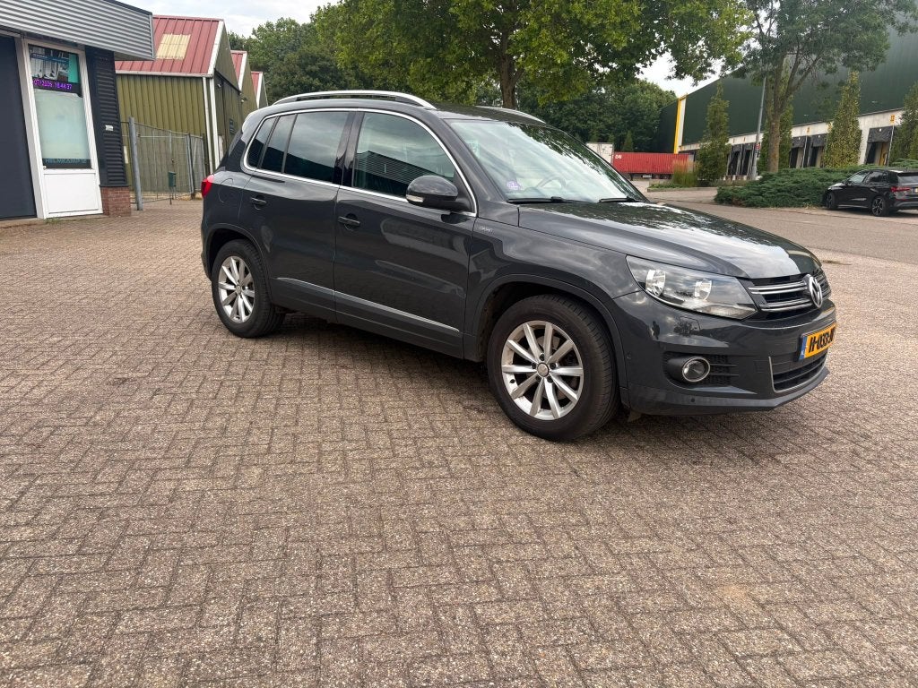 Volkswagen Tiguan 1.4 TSI 118KW Lounge 2015 Grijs, Auto's, Volkswagen, Voorwielaandrijving, Euro 5, 1800 kg, Zwart