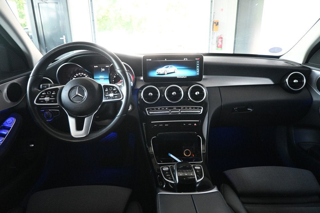 Mercedes-Benz C-Klasse 180 Premium Plus Pack AMG Line Naviga, Met garantie (alle), Leder en Stof, 1595 cc, Sedan