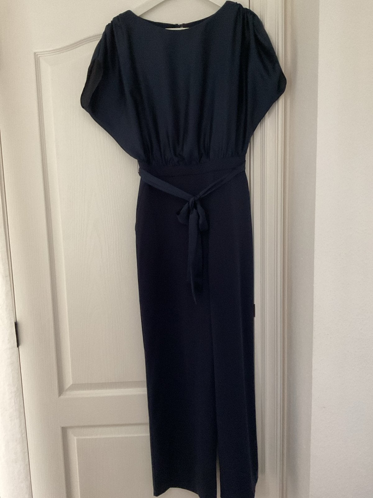 Swing Donkerblauwe jumpsuit met strikceintuur, Ophalen of Verzenden, Zo goed als nieuw, Maat 38/40 (M), Blauw