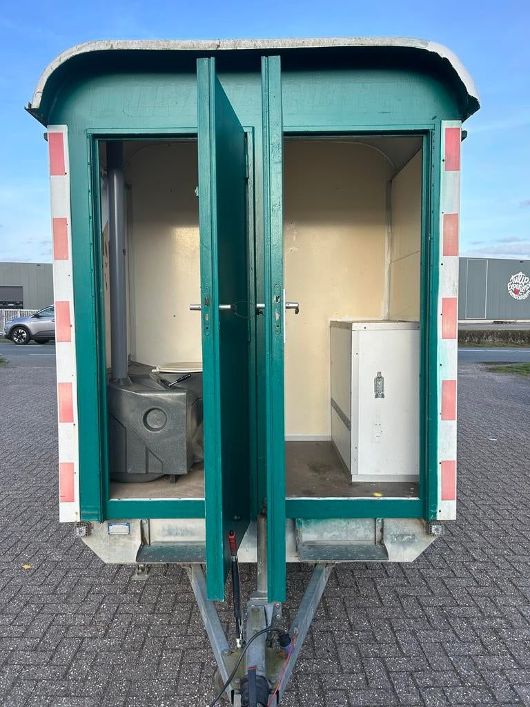Schaftwagen tandemas snelverkeer met toilet en berging, Ophalen