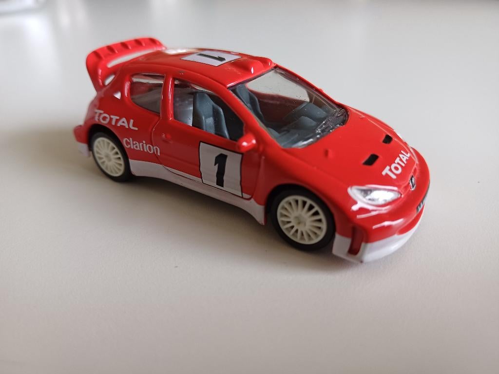 Norev Peugeot 206 wrc auto, Hobby en Vrije tijd, Ophalen of Verzenden, Gebruikt, Auto