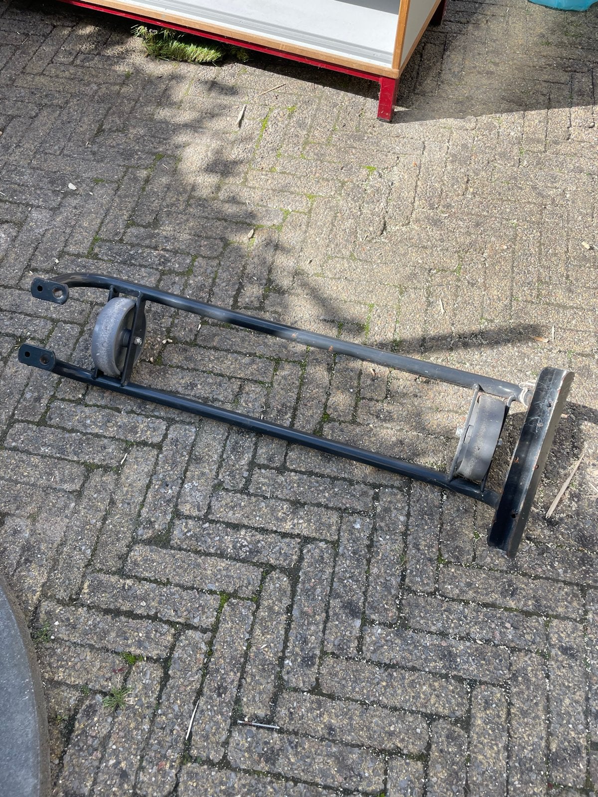 Kantelbeugel voor vouwwagen, Ophalen