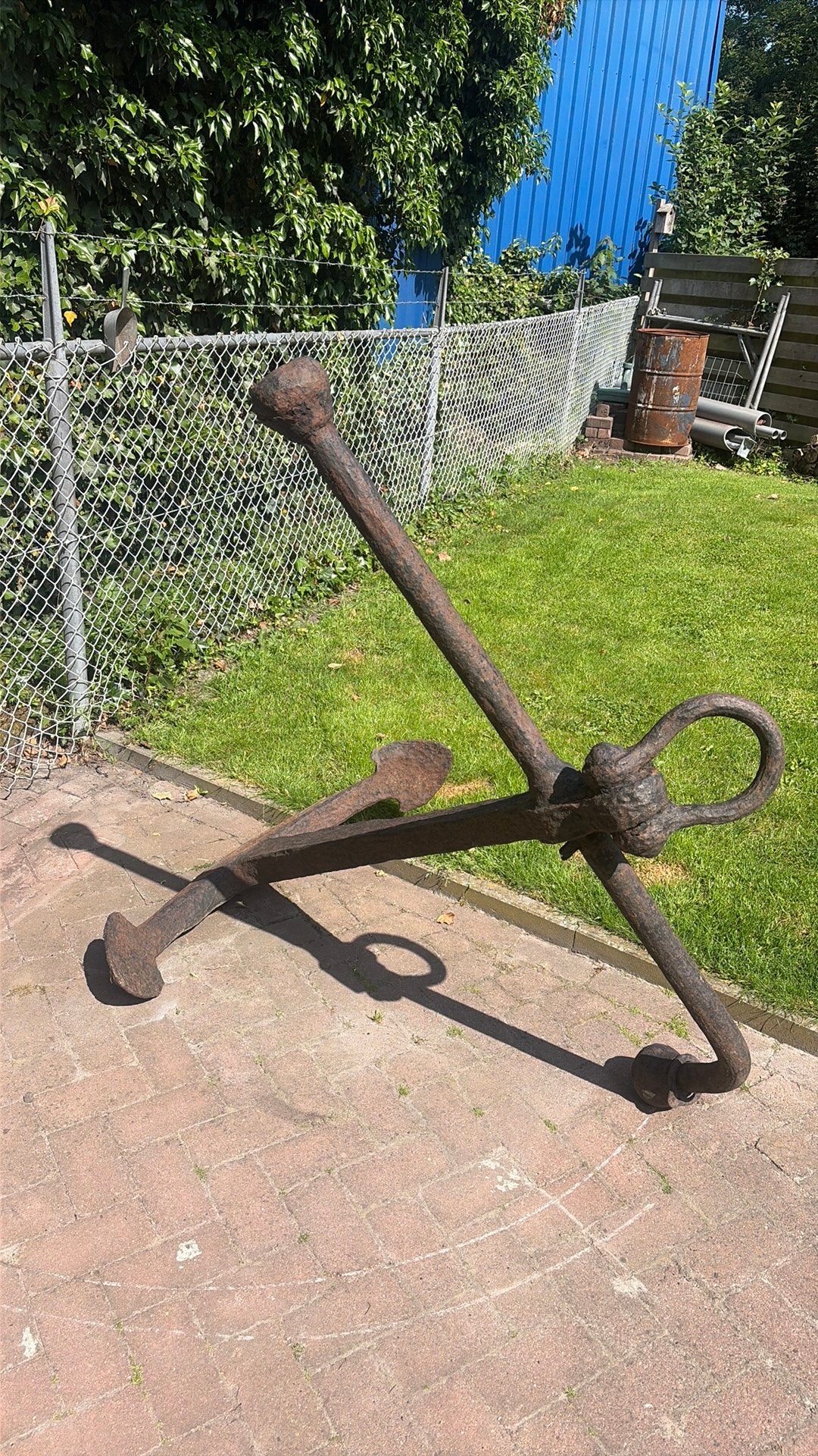 Groot en zwaar anker voor in de tuin, Ophalen